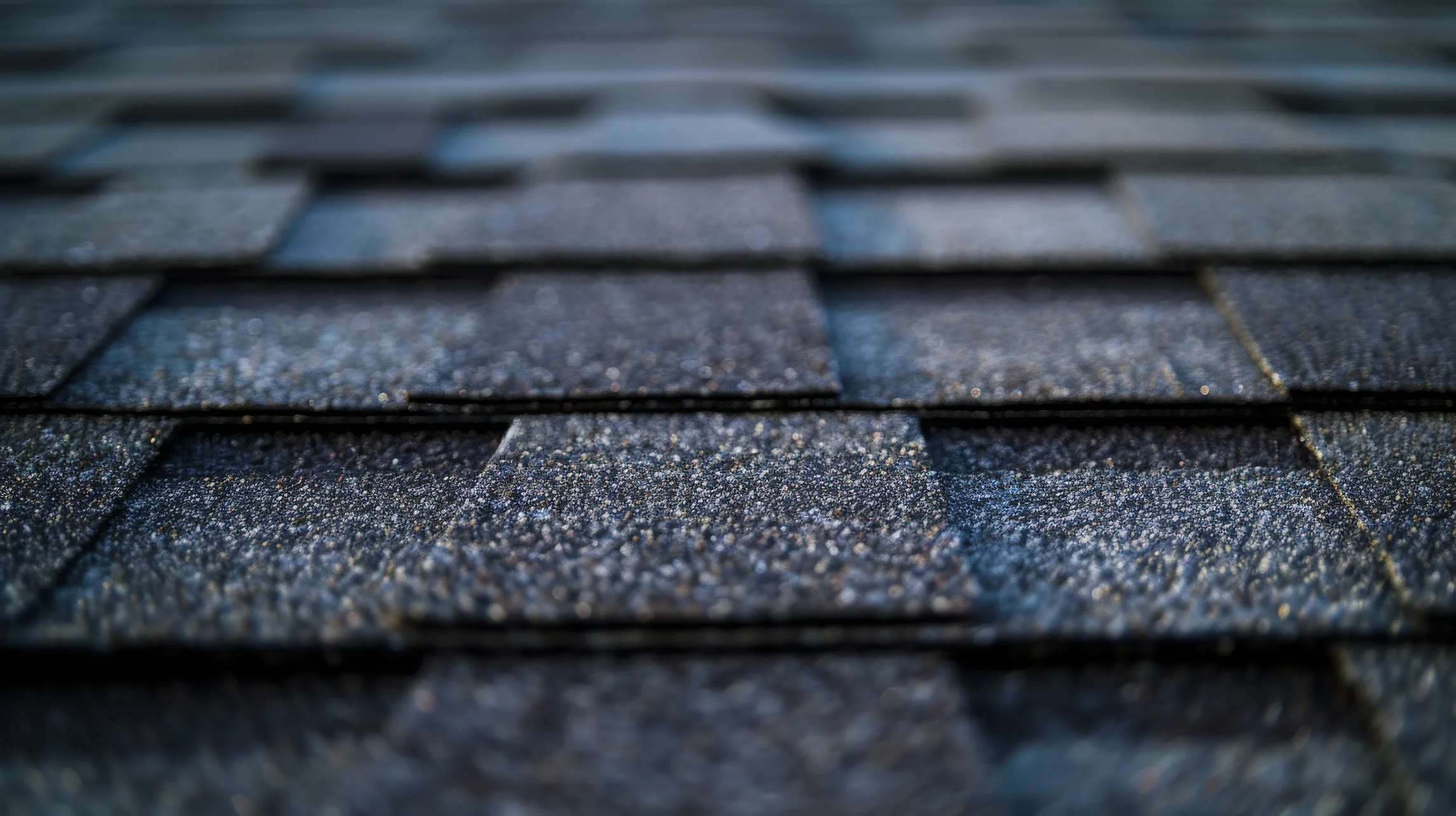 closeup textured asphalt shingle roof home construction roofing projects