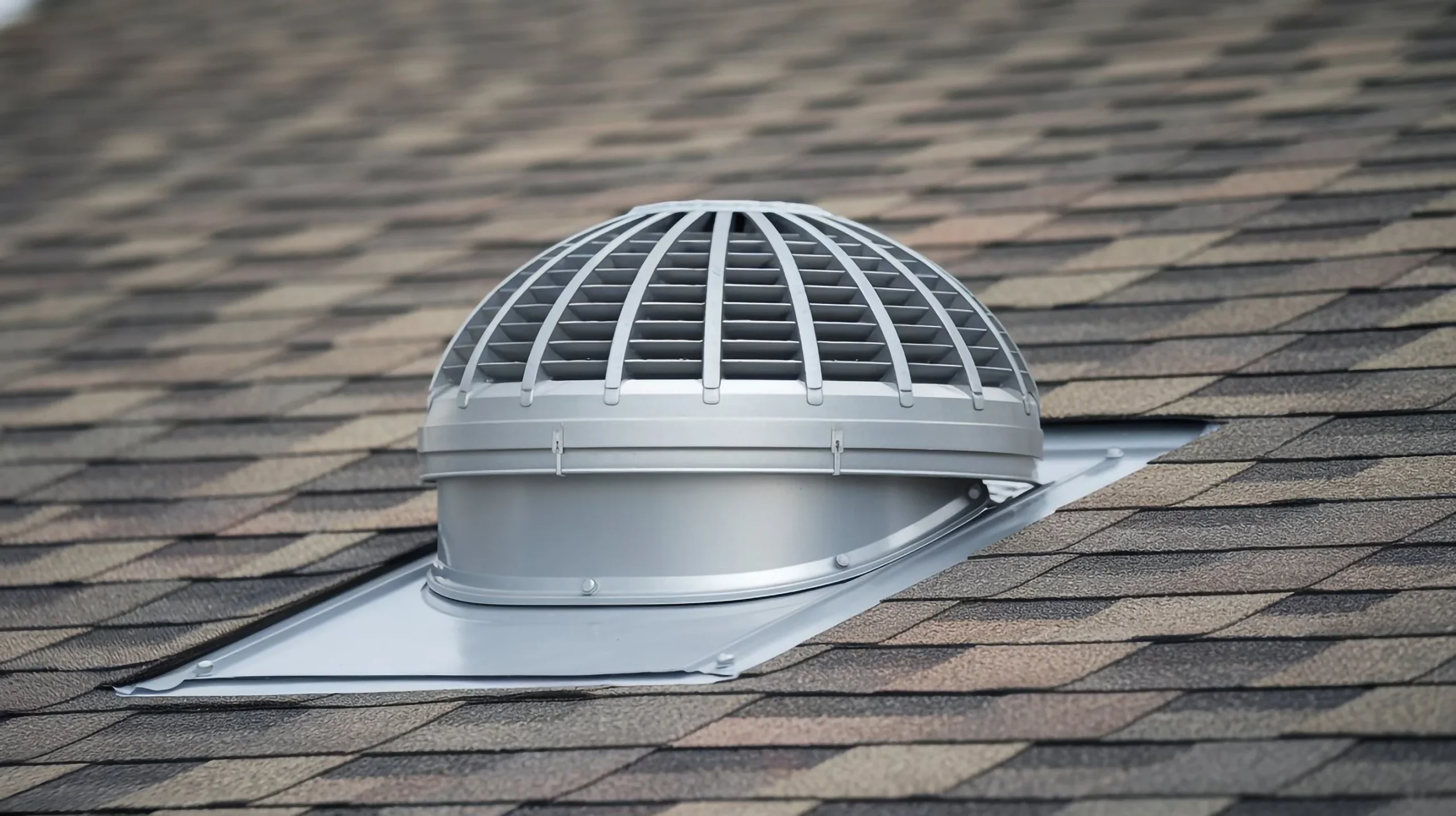 roof ventilation system with dome vent shingles